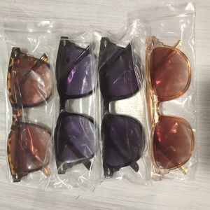 4 pair of sunglasses